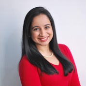 A portrait photo of doctor Zahara Munis, a dentist in Austin, TX