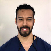 A portrait photo of doctor Jordan Bellman, a dentist in Austin, TX
